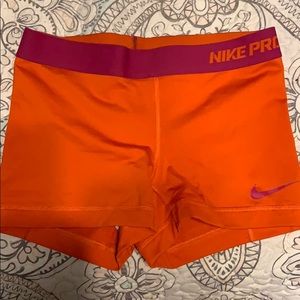 Orange nike spandex size small